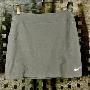Womens black Nike golf skort. Size small. Perfect condition.